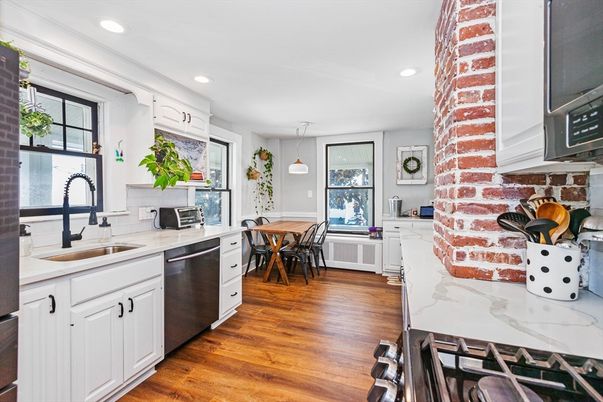 Dining room, Interior, Kitchen, Pendant Lights, Recessed Lighting, Stainless Steel Appliances, Wood Texture Flooring