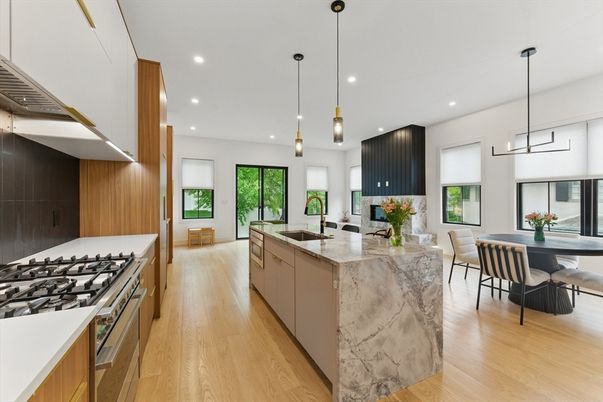 Dining room, Interior, Kitchen, Pendant Lights, Recessed Lighting, Stainless Steel Appliances, Wood Texture Flooring