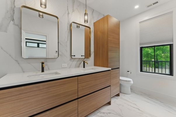 Bathroom, Dual Sink Vanities, Interior, Marble, Marble Walls, Pendant Lights, Recessed Lighting