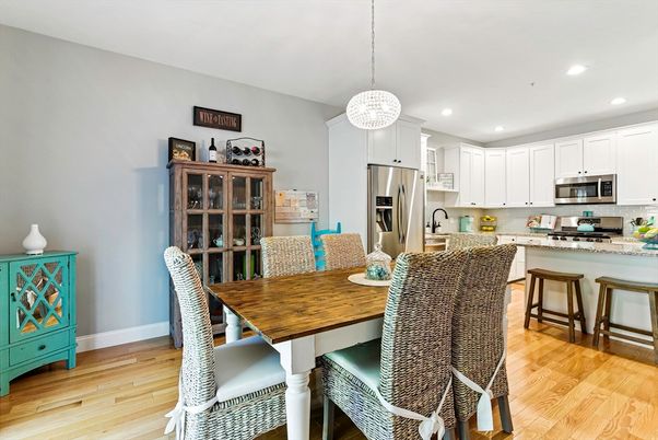 Dining room, Interior, Kitchen, Pendant Lights, Recessed Lighting, Stainless Steel Appliances, Wood Texture Flooring