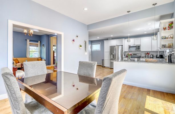 Dining room, Interior, Kitchen, Pendant Lights, Recessed Lighting, Stainless Steel Appliances, Wood Texture Flooring
