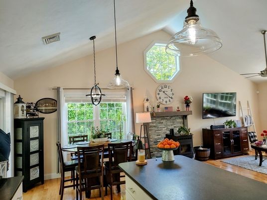 Dining room, Fireplace, Interior, Pendant Lights, Wood Texture Flooring