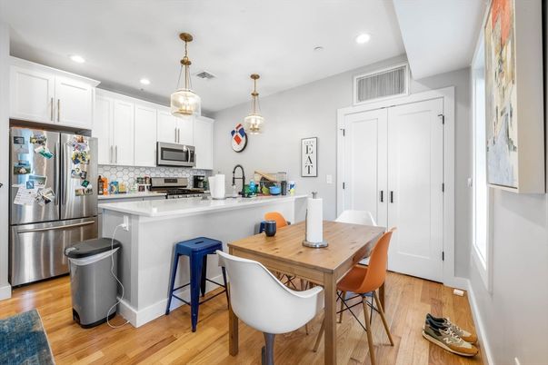 Dining room, Interior, Kitchen, Pendant Lights, Recessed Lighting, Stainless Steel Appliances, Wood Texture Flooring