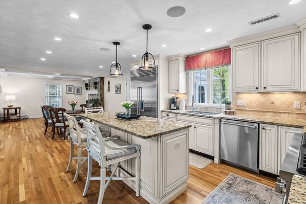 Dining room, Interior, Kitchen, Pendant Lights, Recessed Lighting, Stainless Steel Appliances, Wood Texture Flooring