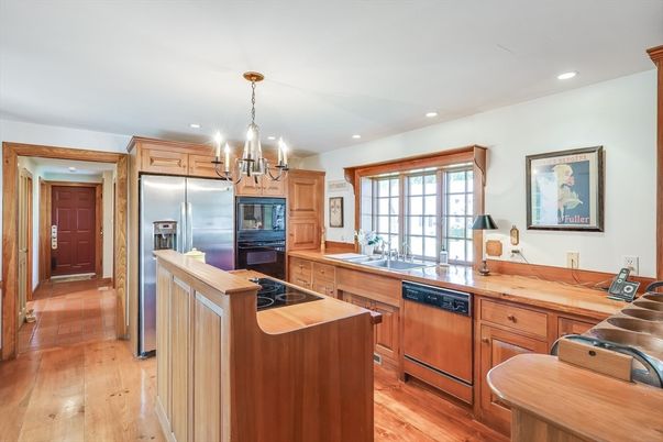 Chandelier, Interior, Kitchen, Recessed Lighting, Stainless Steel Appliances, Wood Texture Flooring