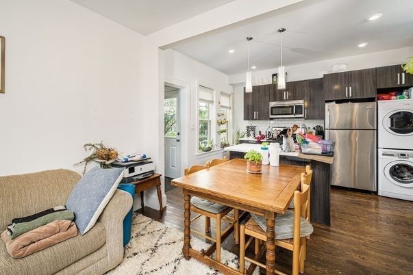 Dining room, Interior, Kitchen, Pendant Lights, Recessed Lighting, Stainless Steel Appliances, Washer, Wood Texture Flooring