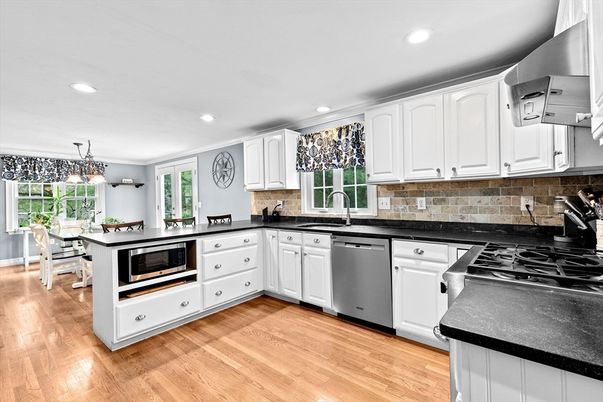 Dining room, Interior, Kitchen, Pendant Lights, Recessed Lighting, Stainless Steel Appliances, Wood Texture Flooring