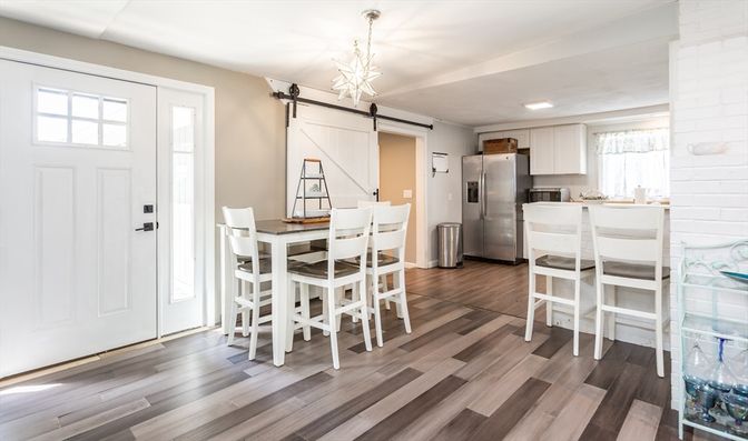Dining room, Interior, Kitchen, Pendant Lights, Recessed Lighting, Stainless Steel Appliances, Wood Texture Flooring