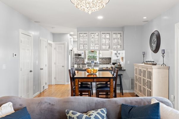 Chandelier, Dining room, Interior, Kitchen, Recessed Lighting, Stainless Steel Appliances, Wood Texture Flooring