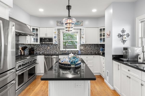 Interior, Kitchen, Pendant Lights, Recessed Lighting, Stainless Steel Appliances, Wood Texture Flooring