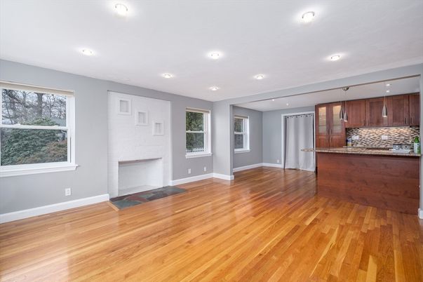 Empty room, Fireplace, Interior, Kitchen, Recessed Lighting, Wood Texture Flooring