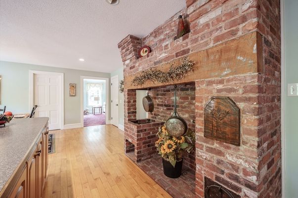 Fireplace, Interior, Recessed Lighting, Stone Walls, Wood Texture Flooring
