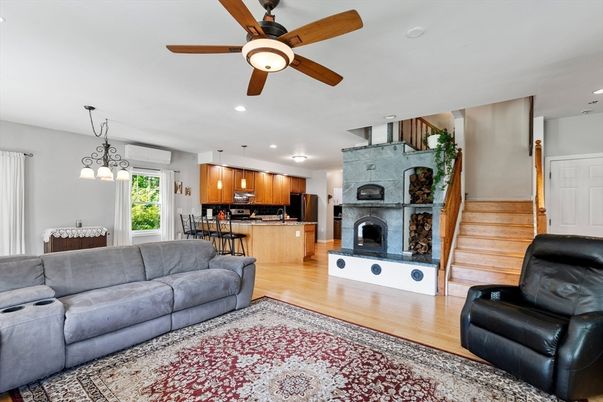Dining room, Fireplace, Interior, Kitchen, Living room, Pendant Lights, Recessed Lighting, Stainless Steel Appliances, Wood Texture Flooring