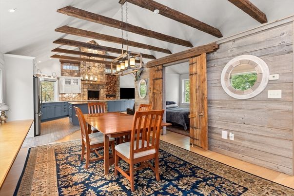 Chandelier, Dining room, Fireplace, Interior, Pendant Lights, Wooden Beams, Wood Texture Flooring, Wooden Walls