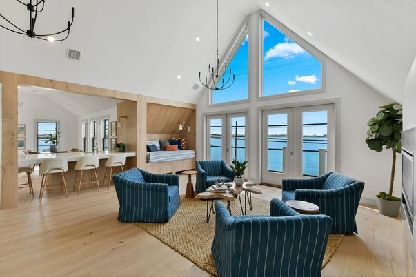 Dining room, Interior, Living room, Pendant Lights, Recessed Lighting, Water, Wood Texture Flooring, Wooden Walls