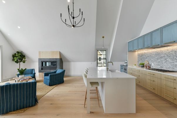Chandelier, Fireplace, Interior, Kitchen, Living room, Pendant Lights, Recessed Lighting, Wood Texture Flooring