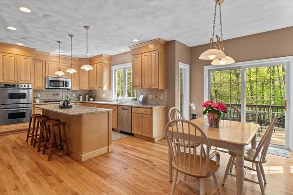 Dining room, Interior, Kitchen, Pendant Lights, Recessed Lighting, Stainless Steel Appliances, Wood Texture Flooring
