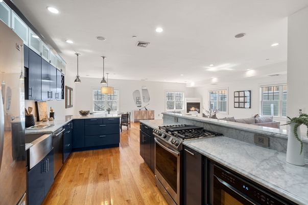 Dining room, Interior, Kitchen, Living room, Pendant Lights, Recessed Lighting, Stainless Steel Appliances, Wood Texture Flooring