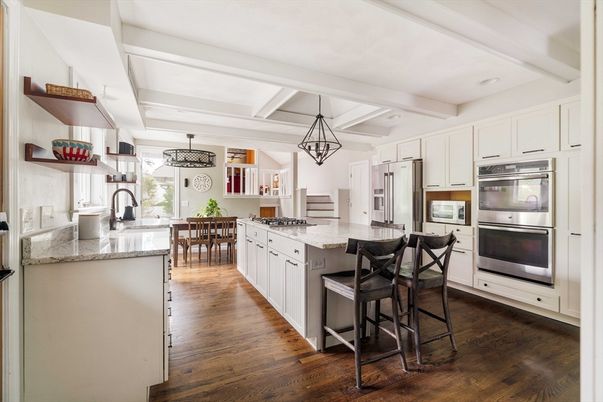 Dining room, Interior, Kitchen, Pendant Lights, Recessed Lighting, Stainless Steel Appliances, Wood Texture Flooring