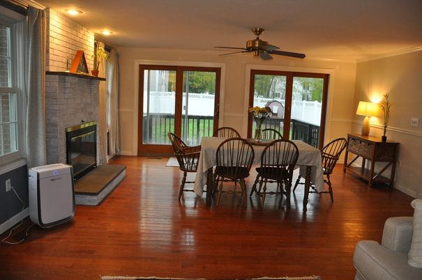 Dining room, Fireplace, Interior, Recessed Lighting, Stone Walls, Wood Texture Flooring