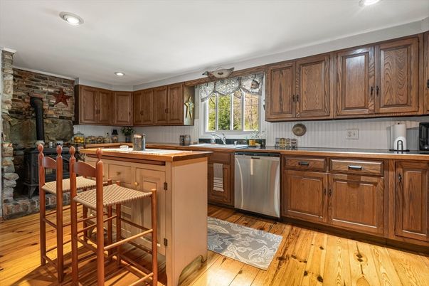 Fireplace, Interior, Kitchen, Recessed Lighting, Stone Walls, Wood Texture Flooring