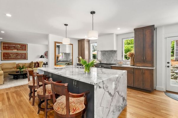 Interior, Kitchen, Marble Walls, Pendant Lights, Recessed Lighting, Stainless Steel Appliances, Wood Texture Flooring
