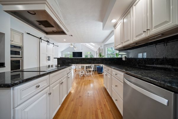 Dining room, Interior, Kitchen, Recessed Lighting, Stainless Steel Appliances, Wood Texture Flooring