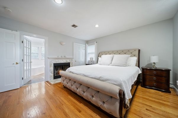 Bedroom, Fireplace, Interior, Recessed Lighting, Wood Texture Flooring