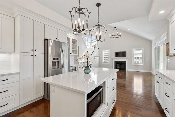 Chandelier, Fireplace, Interior, Kitchen, Pendant Lights, Recessed Lighting, Stainless Steel Appliances, Wood Texture Flooring