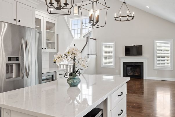 Chandelier, Fireplace, Interior, Kitchen, Pendant Lights, Recessed Lighting, Stainless Steel Appliances, Wood Texture Flooring