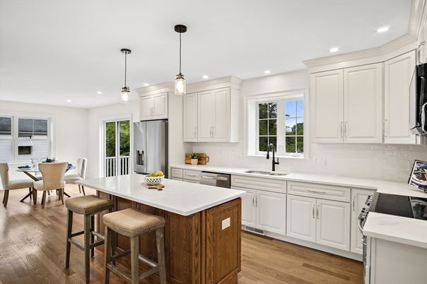 Dining room, Interior, Kitchen, Pendant Lights, Recessed Lighting, Stainless Steel Appliances, Wood Texture Flooring