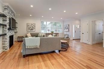 Fireplace, Interior, Living room, Recessed Lighting, Stone Walls, Wood Texture Flooring