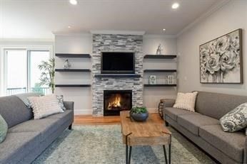 Fireplace, Interior, Living room, Recessed Lighting, Stone Walls, Wood Texture Flooring
