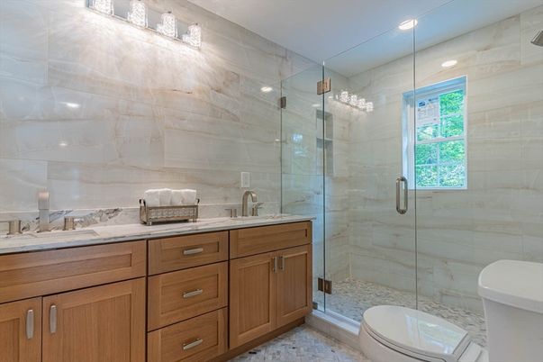 Bathroom, Dual Sink Vanities, Glass Shower, Interior, Marble Walls, Recessed Lighting