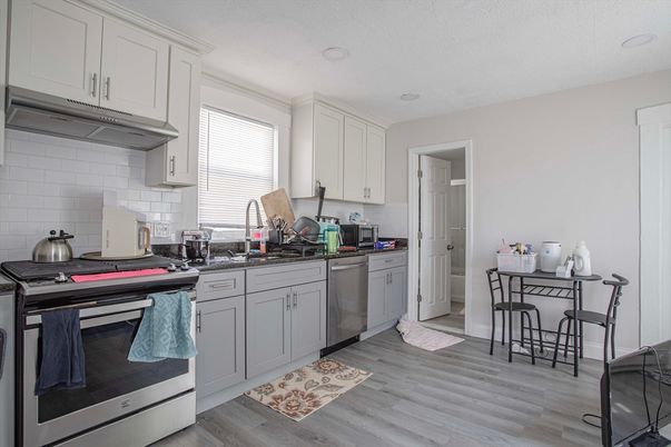 Interior, Kitchen, Recessed Lighting, Stainless Steel Appliances, Wood Texture Flooring