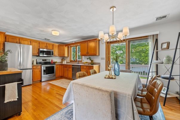 Dining room, Interior, Kitchen, Pendant Lights, Stainless Steel Appliances, Wood Texture Flooring