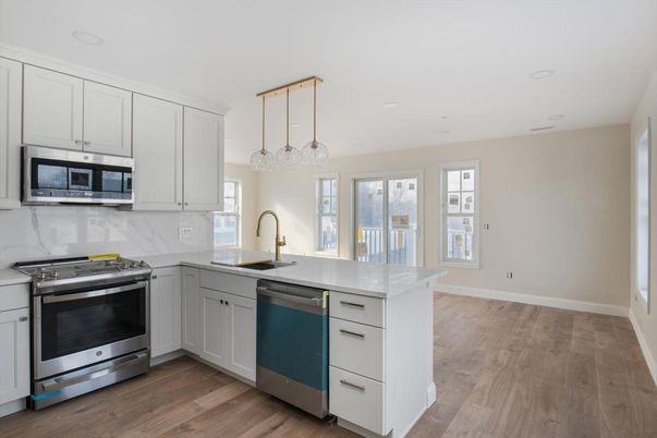 Interior, Kitchen, Pendant Lights, Recessed Lighting, Stainless Steel Appliances, Wood Texture Flooring