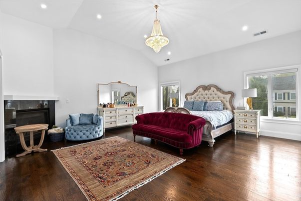 Bedroom, Fireplace, Interior, Pendant Lights, Recessed Lighting, Wood Texture Flooring