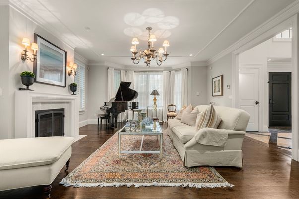 Chandelier, Fireplace, Interior, Living room, Piano, Recessed Lighting, Wood Texture Flooring