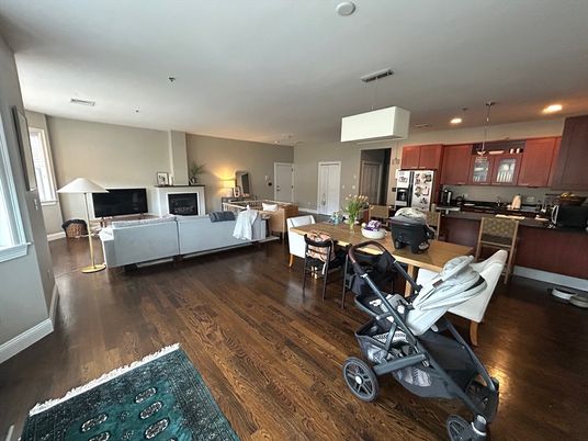 Dining room, Fireplace, Interior, Kitchen, Living room, Pendant Lights, Recessed Lighting, Stainless Steel Appliances, Wood Texture Flooring