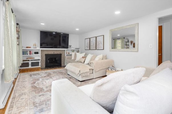 Fireplace, Interior, Living room, Recessed Lighting, Wood Texture Flooring