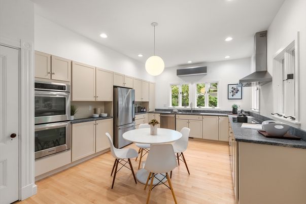 Dining room, Interior, Kitchen, Pendant Lights, Recessed Lighting, Stainless Steel Appliances, Wood Texture Flooring