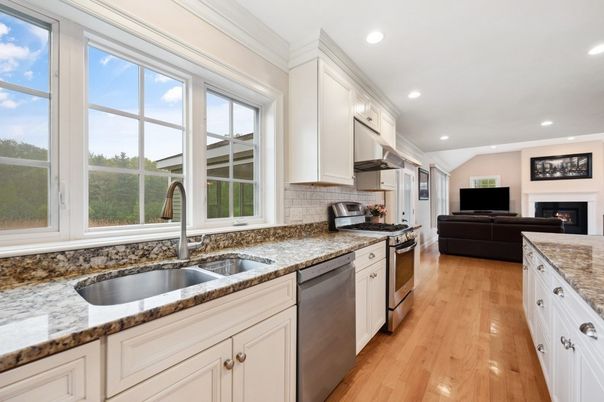 Fireplace, Interior, Kitchen, Living room, Recessed Lighting, Stainless Steel Appliances, Wood Texture Flooring