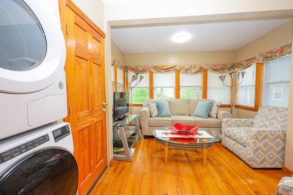 Interior, Living room, Utility Closets, Washer, Wood Texture Flooring
