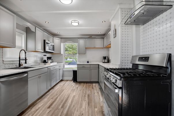 Interior, Kitchen, Recessed Lighting, Stainless Steel Appliances, Wood Texture Flooring