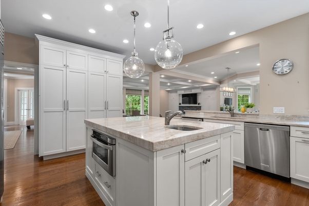 Chandelier, Interior, Kitchen, Pendant Lights, Recessed Lighting, Stainless Steel Appliances, Wood Texture Flooring