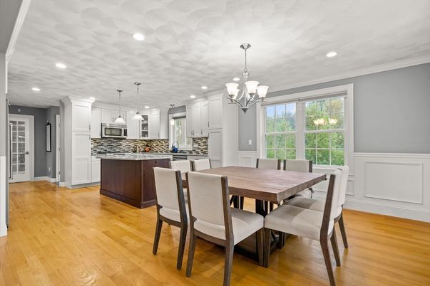 Chandelier, Dining room, Interior, Kitchen, Pendant Lights, Recessed Lighting, Stainless Steel Appliances, Wood Texture Flooring