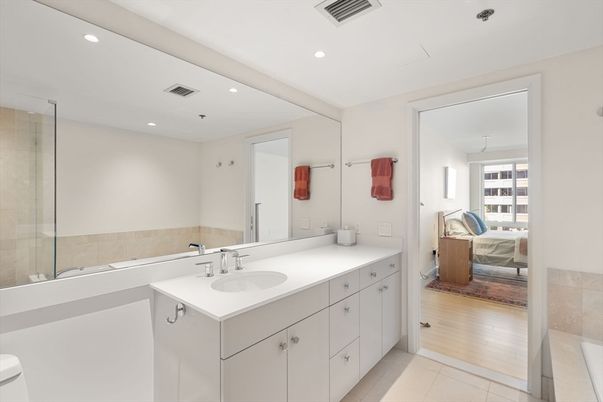 Bathroom, Bedroom, Dual Sink Vanities, Glass Shower, Interior, Recessed Lighting, Wood Texture Flooring