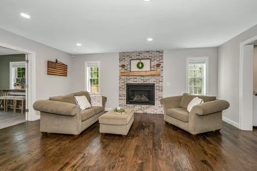 Fireplace, Interior, Living room, Recessed Lighting, Stone Walls, Wood Texture Flooring