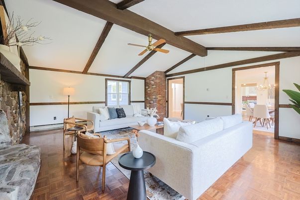 Chandelier, Dining room, Fireplace, Interior, Living room, Stone Walls, Wooden Beams, Wood Texture Flooring